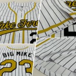 Maillot de baseball doré noir à rayures blanches, ancien et authentique Maillot de baseball doré noir à rayures blanches, ancien et authentique